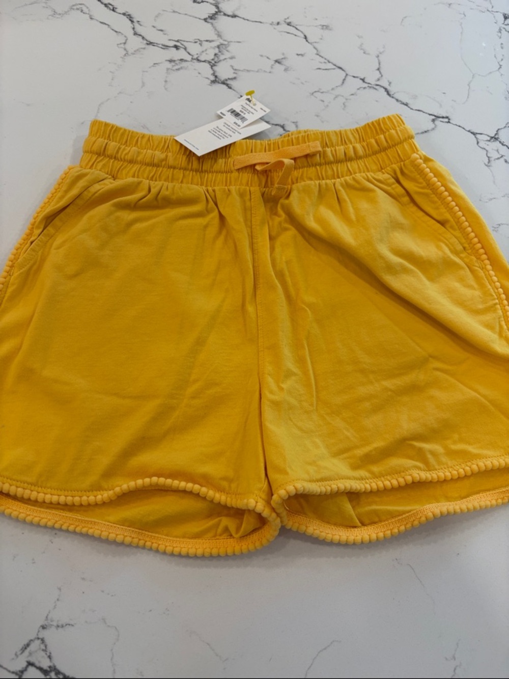 Tea Collection Yellow Pom-Trim Kids Shorts